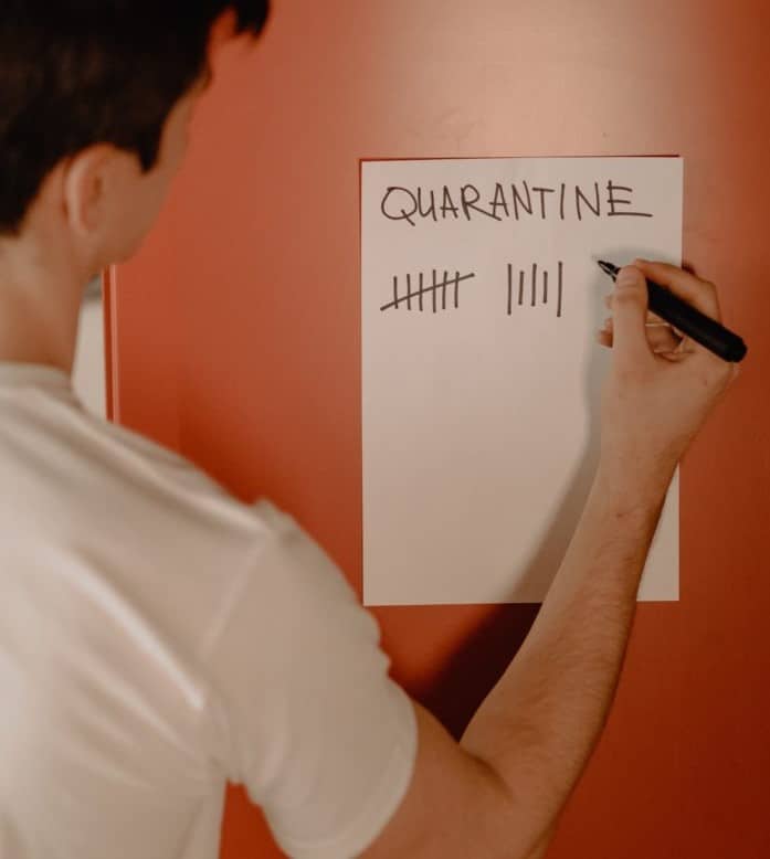 Man tallying the days in quarantine